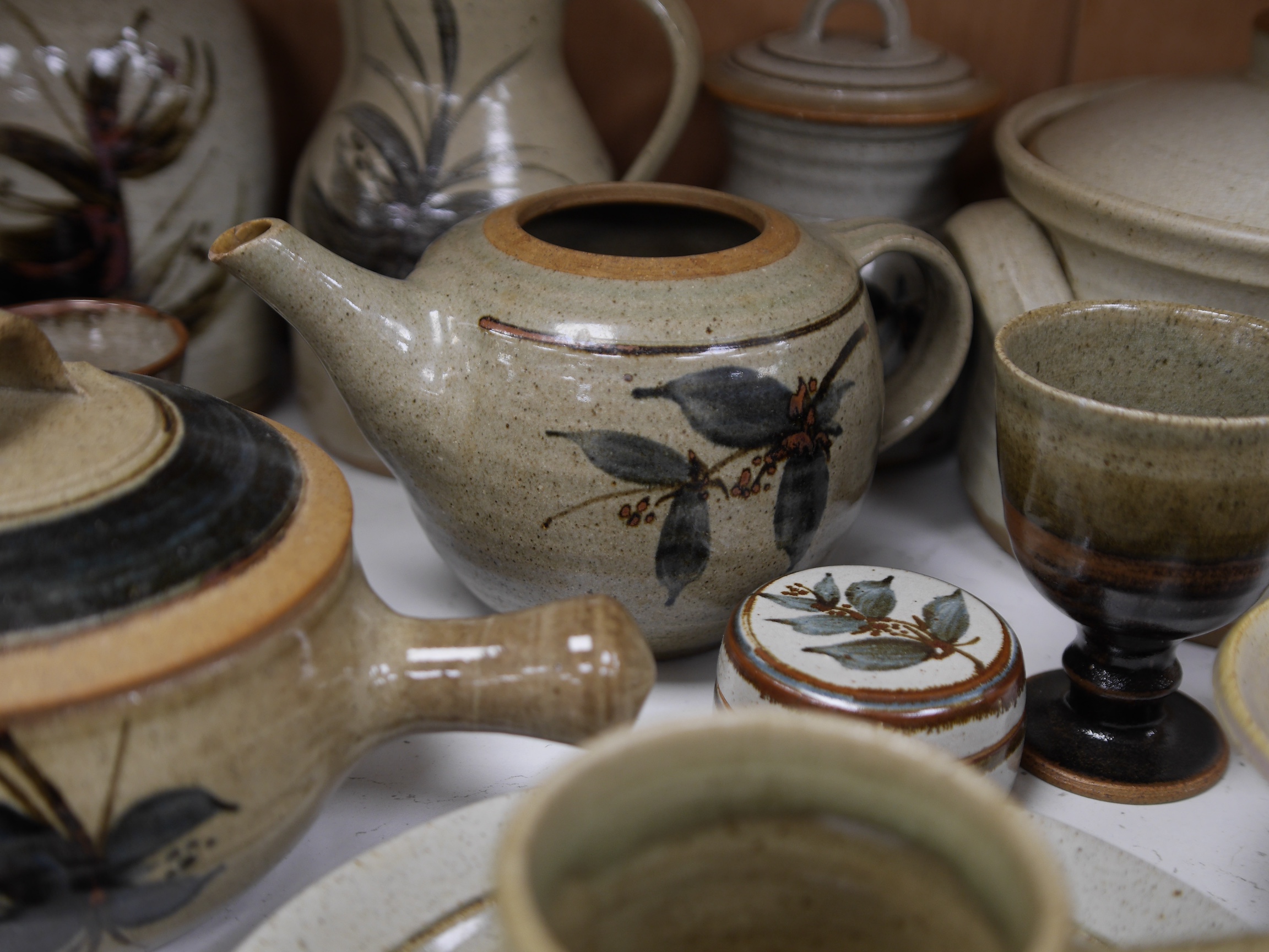 A large collection of Studio ceramics by John Davidson, Truro Pottery, largest item casserole pot and cover 20cm high (31). Condition - teapot has cover missing, but rest mostly good